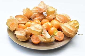 natural cape gooseberry on wooden background