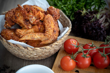 crispy fried chicken in the basket with salad