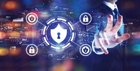 Cyber security theme with businessman on night city background