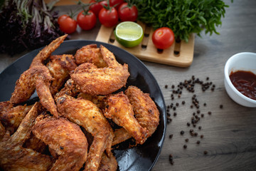 Hot Meat Dishes - Fried Chicken Wings on plate with salad