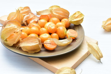 natural cape gooseberry on wooden background