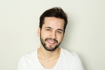 Fototapeta premium Handsome smiling man with white teeth