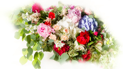 Floral bouquet of different flowers on a white background