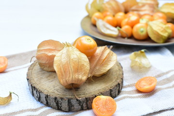 natural cape gooseberry on wooden background