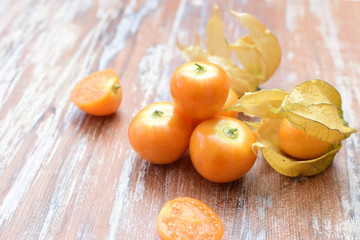  natural cape gooseberry on wooden background