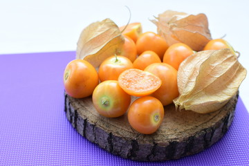  natural cape gooseberry on wooden background