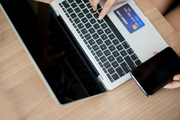 Shopping online, Laptop, Smartphone and Use Credit Card for pay, Easy shopping and pay Concept.