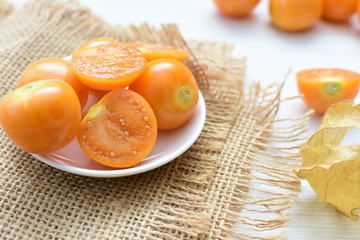  natural cape gooseberry on wooden background
