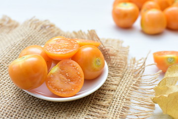  natural cape gooseberry on wooden background