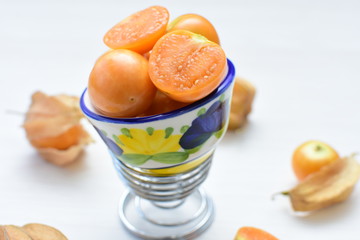  natural cape gooseberry on wooden background