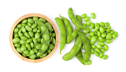 Green soy beans in wood bowl isolated on white background