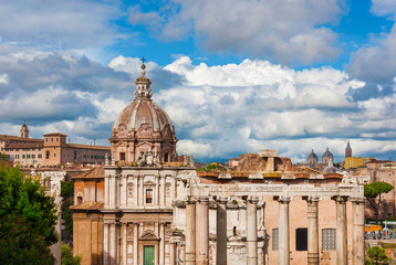 Fototapeta na wymiar View of Rome historic center skyline from Capitoline Hill, with ancient ruins and baroque domes