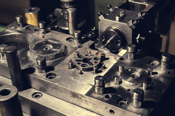 Sheet Metal Stamping Tool Die for Automotive Precision Parts on The Numerical Control Milling Machine Table. Tandem Stamping System. At a High Quality Technology Factory.