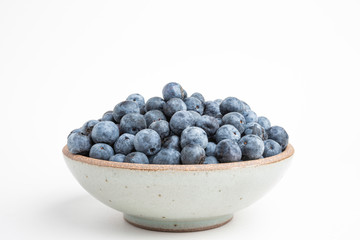 Fresh Blueberries In Glazed Bowl