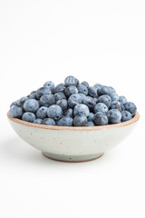 Fresh Blueberries In Glazed Bowl