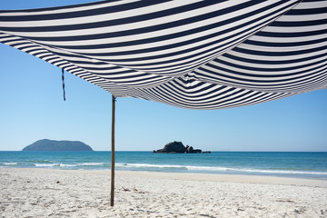 Cool beach tents and the sea 