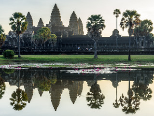 Fototapeta na wymiar Angkor Wat Temple Grounds and Reflecting Pool at Sun Rise in Siem Reap Cambodia