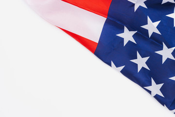 US American flag on white background. For USA Memorial day,  Memorial day, Presidents day, Veterans day, Labor day, Independence day, or 4th of July celebration. Top view, copy space for text.