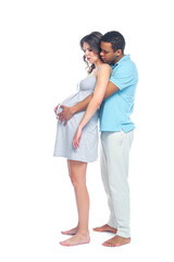 A young black man helps his white wife with birth pain with a ball. Partnered birth, partnered delivery. Isolated white background.