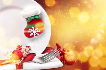Christmas decorations on plate with kitchen appliances