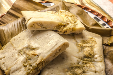 Oaxacan tamal made of corn chicken pork and chili