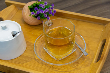 tea in a plate wooden