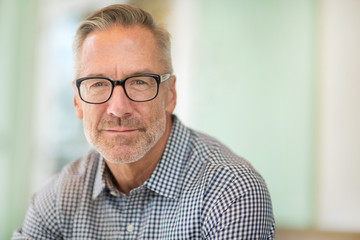 Mature handome fit man sitting outside stock photo