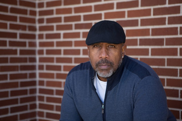 Mature African American man in deep thought.