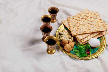Passover matzoh jewish holiday bread matzos with four cup of wine