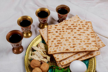 Jewish holiday Passover with matzah, pesah celebration four cup of kosher wine