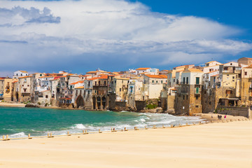 Italy, Sicily, Palermo Province, Cefalu. The beach on the Mediterranean Sea in the Sicilian town of Cefalu.