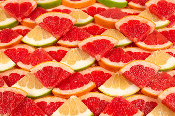 Pomelo and grapefruit slices background.