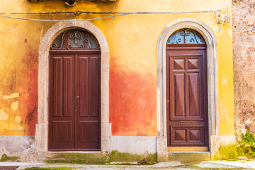Italy, Sicily, Province of Messina, Novara di Sicilia. Decorative doors in the medieval hill town of Francavilla di Sicilia.