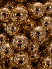 reflection in the christmas ornaments