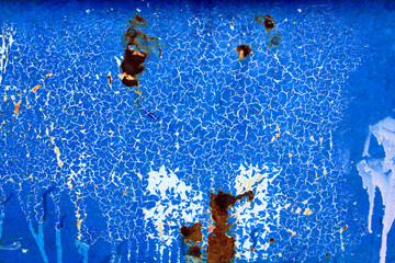 Abstract background rust on a blue wall