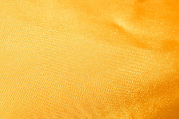 streak of golden fabric abstract background