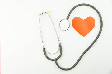 stethoscope with red heart for doctor checkup. Medical tool cardiology concept.
