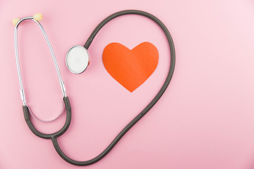stethoscope with red heart for doctor checkup. Medical tool cardiology concept.