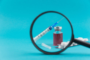 Pharmaceutical research and clinical trials concept. Medicine vial bottle for injection with...