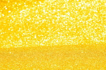 sparkles of golden glitter texture background