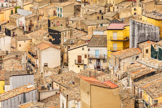 Italy, Sicily, Province of Palermo, Prizzi. View of homes and buildings in the ancient hill town of Prizzi.