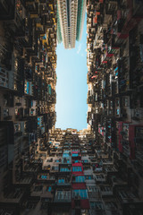 Vertical Look Up View of Hong Kong Apartment with Vibrant Colours and Beautiful Density