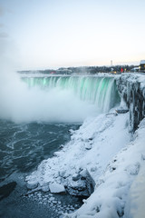 niagara falls in winter with frozen arctic landscape