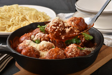 Serving spaghetti and meatballs