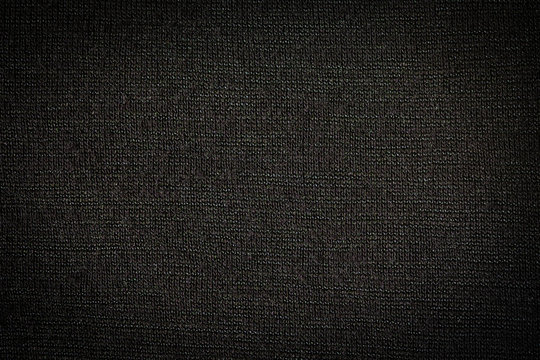 Black fabric, luxury dark gray background abstract. Material are used in textile assembly. Detail cloth texture of pattern. Design, elegance with vignette effect, free copy space for text placement. © otello-stpdc
