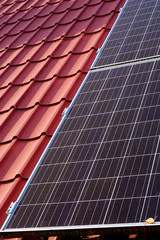photovoltaic panels on the roof of a single-family house in the countryside