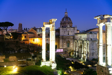 Fototapeta na wymiar Rome, Italy - Jan 1, 2020: Night view of the Roman Forum, Rome, Lazio, Italy