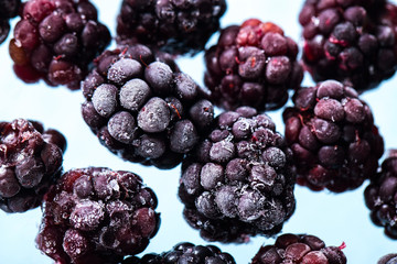 Frozen forest blackberries close-up, fresh frozen organic berries