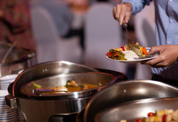 Food Buffet Catering Dining Eating Party Sharing Concept.people group catering buffet food indoor in luxury restaurant with meat colorful fruits and vegetables