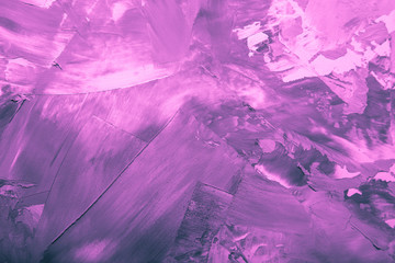 Textured plastered background with a variety of arbitrary stains. Purple. Toned